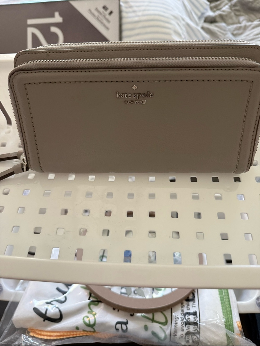 kate spade neutral taupe zip-around double compartment wallet